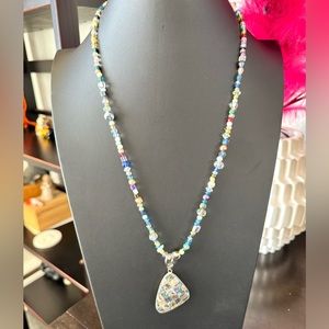 Artisan Long Beaded Necklace with Checkered Shell Pendant